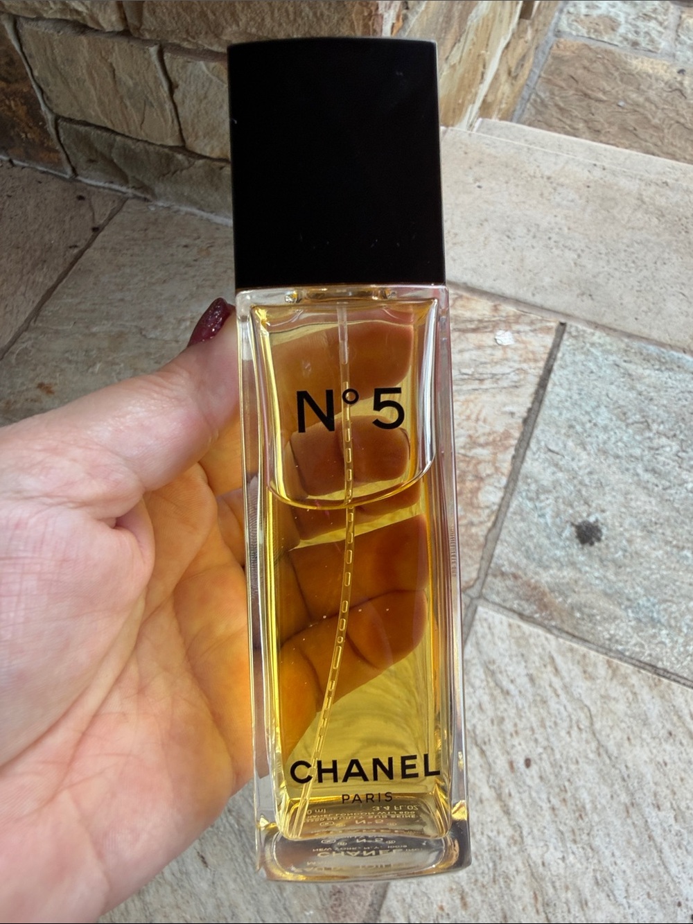 CHANEL — Clear Bottle with Black Cap and Golden Liquid - Picture 2 of 9